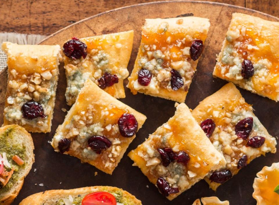 <p>Mark Boughton</p><p>Nobody will every guess this elegant appetizer starts with a can of crescent rolls.</p><p><strong>Get the recipe: <a href="https://parade.com/841935/rosemaryblack/blue-cheese-walnut-flatbread/" rel="nofollow noopener" target="_blank" data-ylk="slk:Blue Cheese Walnut Flatbread;elm:context_link;itc:0;sec:content-canvas" class="link ">Blue Cheese Walnut Flatbread</a></strong></p>