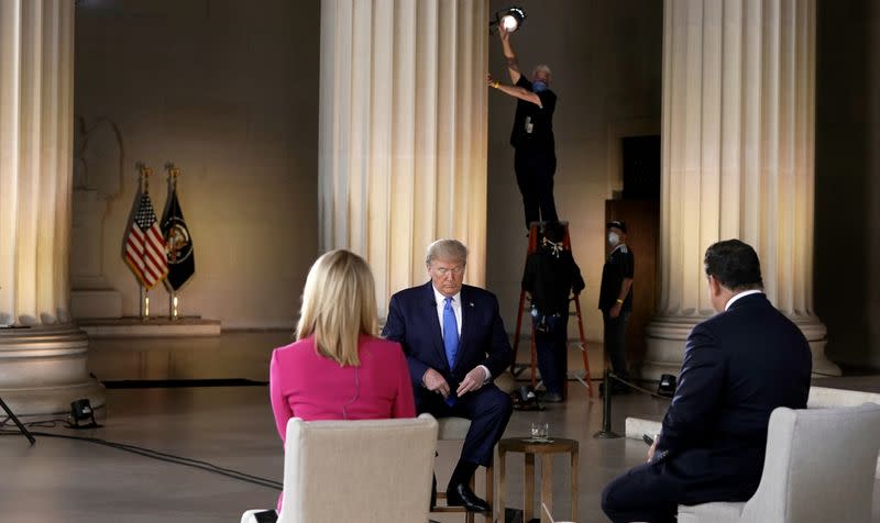 U.S. President Donald Trump participates in coronavirus disease (COVID-19) live town on hall on America returning to work held at Lincoln Memorial in Washington