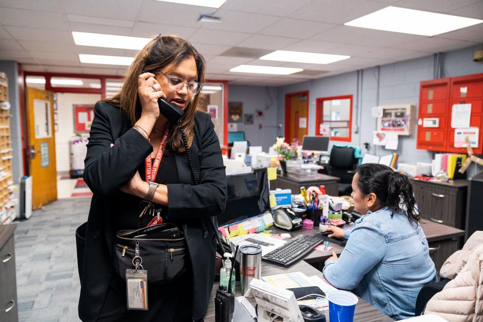 Jasibi Crews, principal of Cora Kelly School in Alexandria, Va., negotiates with a production company that was running late for a school assembly.