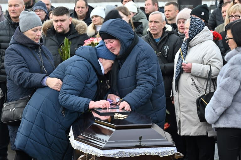 A seven-year-old, a four-year-old and a ten-month-old boy were killed in the attack, along with their mother and father (SERGEY BOBOK)