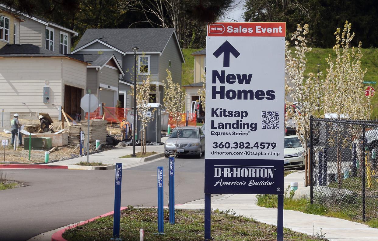 A sign points the way to the new houses for sale at Kitsap Landing off of Wheaton Way in Bremerton on Wednesday, April 3, 2024.