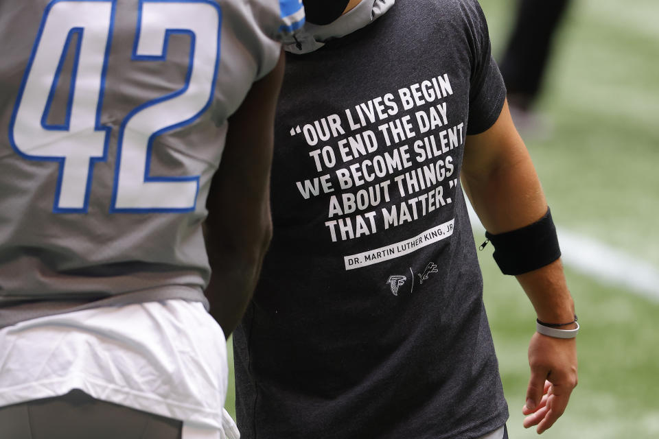 The Lions are wearing T-shirts honoring Martin Luther King Jr. (Kevin C. Cox/Getty Images)