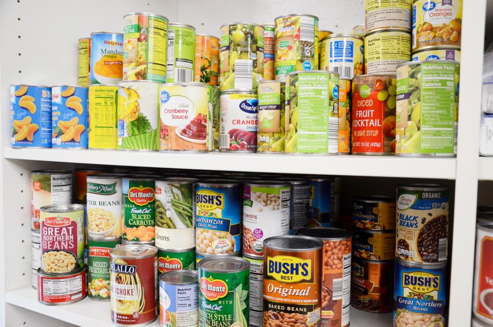 Canned food lines the shelves at the Manna Food Project, located at 8791 McBride Park Ct. in Harbor Springs.