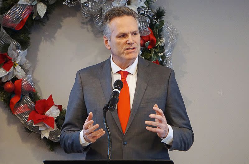 FILE PHOTO: Alaska Governor Mike Dunleavy speaks at the Petroleum Club in Anchorage