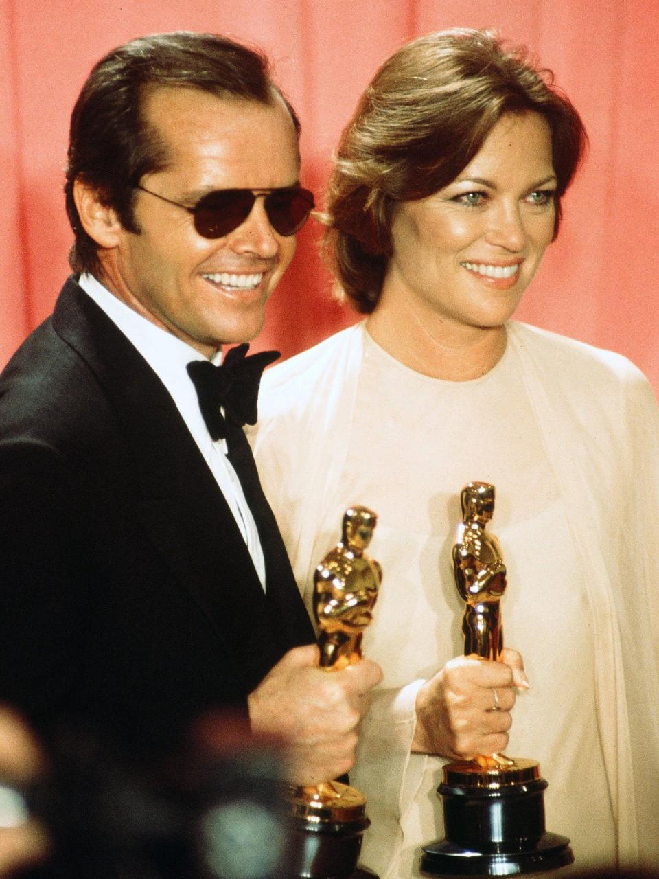 Fletcher with Jack Nicholson after winning the Best Actress Oscar at the Academy Awards in 1976 (Getty)