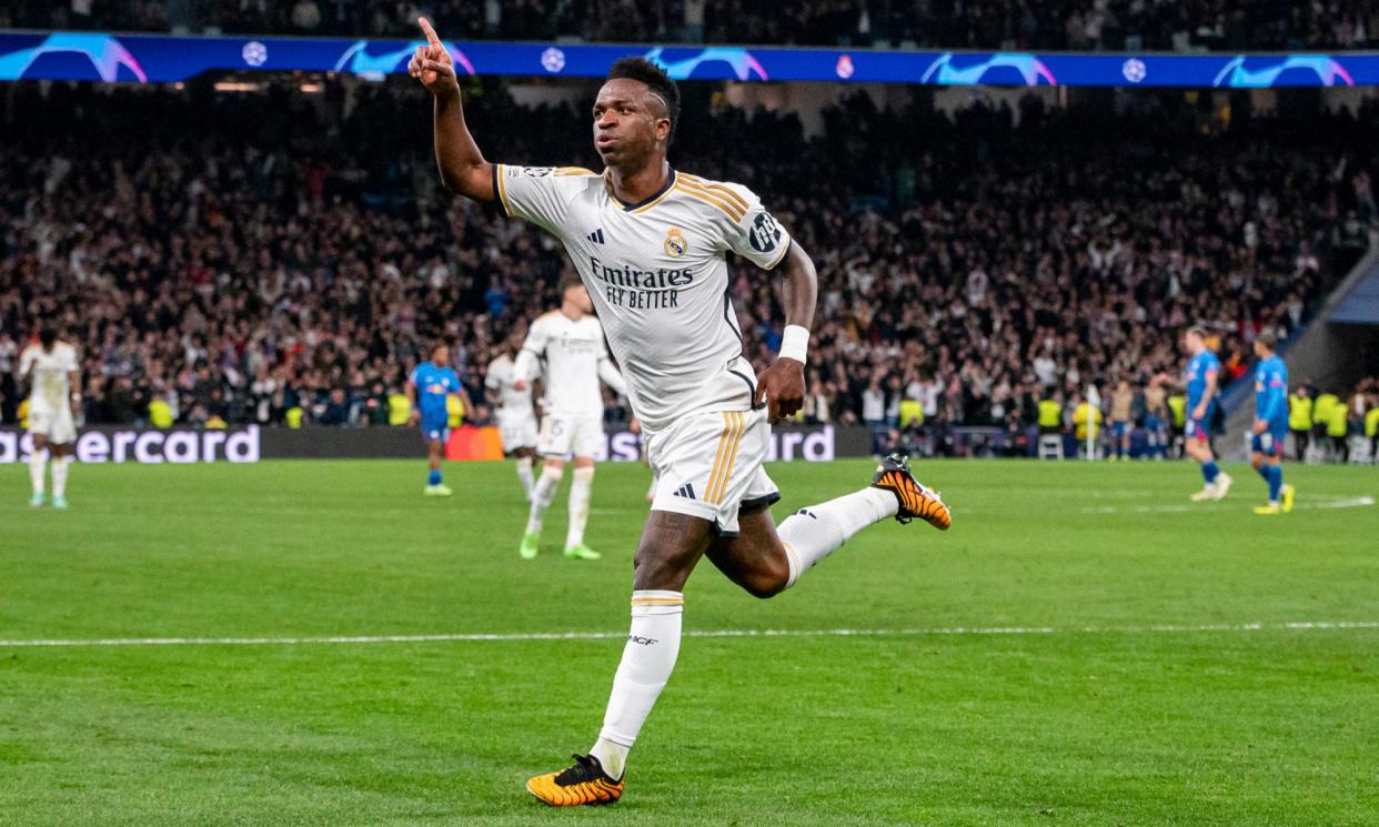 <span>Vinícius Júnior wheels away in celebration after scoring the tie’s decisive goal.</span><span>Photograph: Eurasia Sport Images/Getty Images</span>