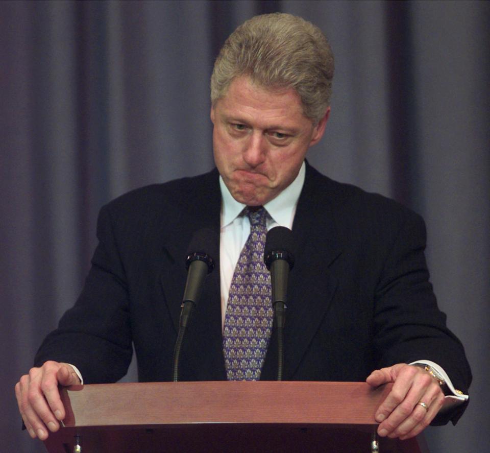 President Clinton ponders a question about the impeachment hearings during a news conference in 1998. (Photo: Susan Walsh/AP)