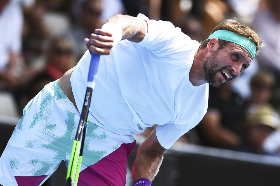 Tennys Sandgren of the U.S. plays a shot to Philipp Kohlschreiber of Germany during the semifinal match of the ASB Classic Mens tennis tournament in Auckland, New Zealand, Friday, Jan 11, 2019. (AP Photo/Chris Symes)