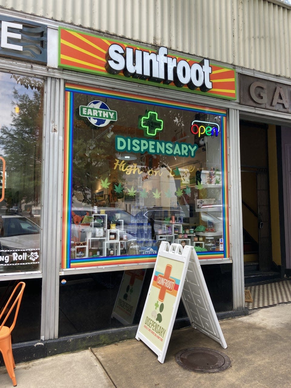The front of SunFroot, a dispensary in Downtown Asheville