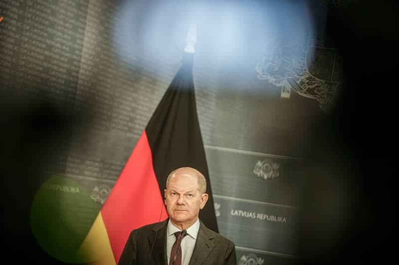 German Chancellor Olaf Scholz speaks during a press conference together with the Baltic prime ministers in Riga. Kay Nietfeld/dpa