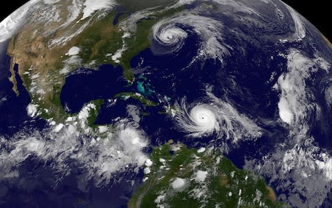  satellite image of Hurricane Maria and Hurricane Jose in the Atlantic Ocean - Credit: NASA/Reuters