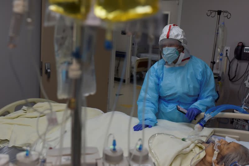 A woman says goodbye to her mother in a COVID-19 ICU in Houston