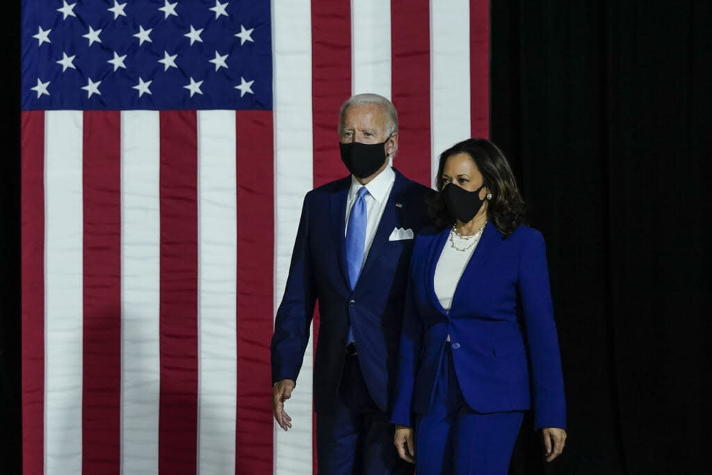 Presumptive Democratic presidential nominee former Vice President Joe Biden and his running mate Sen. Kamala Harris (D-CA) arrive to deliver remarks at the Alexis Dupont High School on August 12, 2020 in Wilmington, Delaware. (Photo by Drew Angerer/Getty Images)