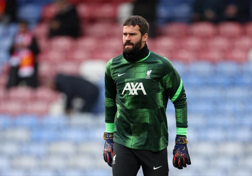 Surprise absence: Alisson Becker has been expected to return to action at Brentford (REUTERS)