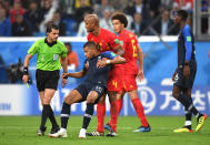 <p>Kylian Mbappe of France is shown a yellow card by referee Andres Cunha during the 2018 FIFA World Cup Russia Semi Final match between Belgium and France at Saint Petersburg Stadium on July 10, 2018 in Saint Petersburg, Russia. (Photo by Shaun Botterill/Getty Images) </p>