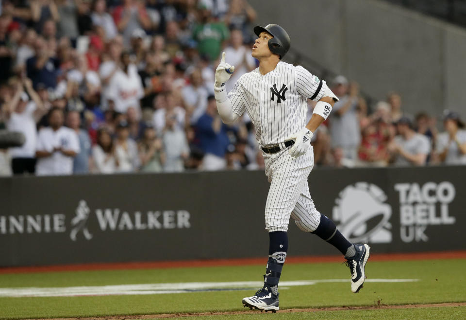 New York Yankees' Aaron Judge reacts as he rounds the bases after a two-run home run against the Boston Red Sox during the fourth inning of a baseball game, Saturday, June 29, 2019, in London. Major League Baseball made its European debut game today at London Stadium. (AP Photo/Tim Ireland)