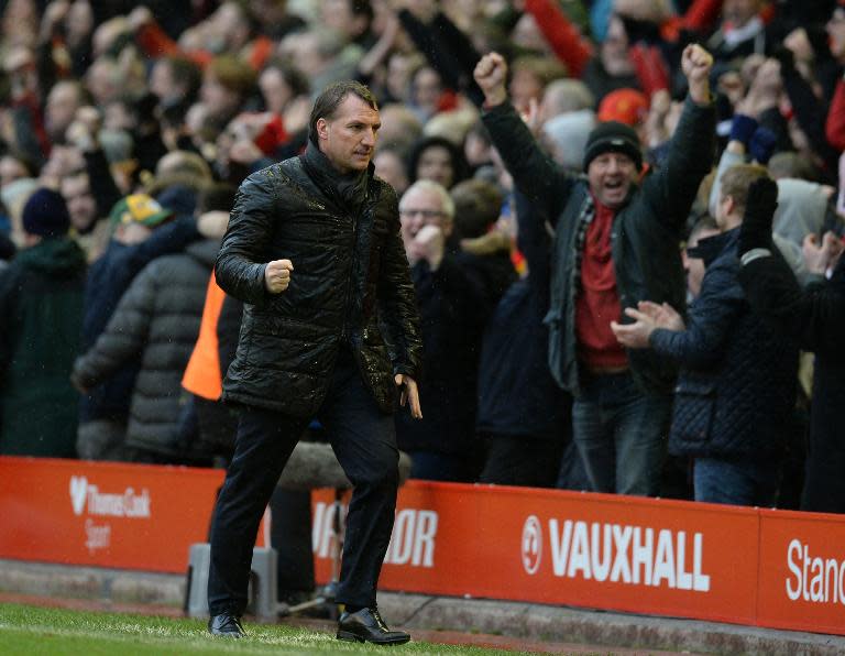 Liverpool's manager Brendan Rodgers celebrates at the final whistle of their English Premier League match against Manchester City, at Anfield in Liverpool, north-west England, on March 1, 2015