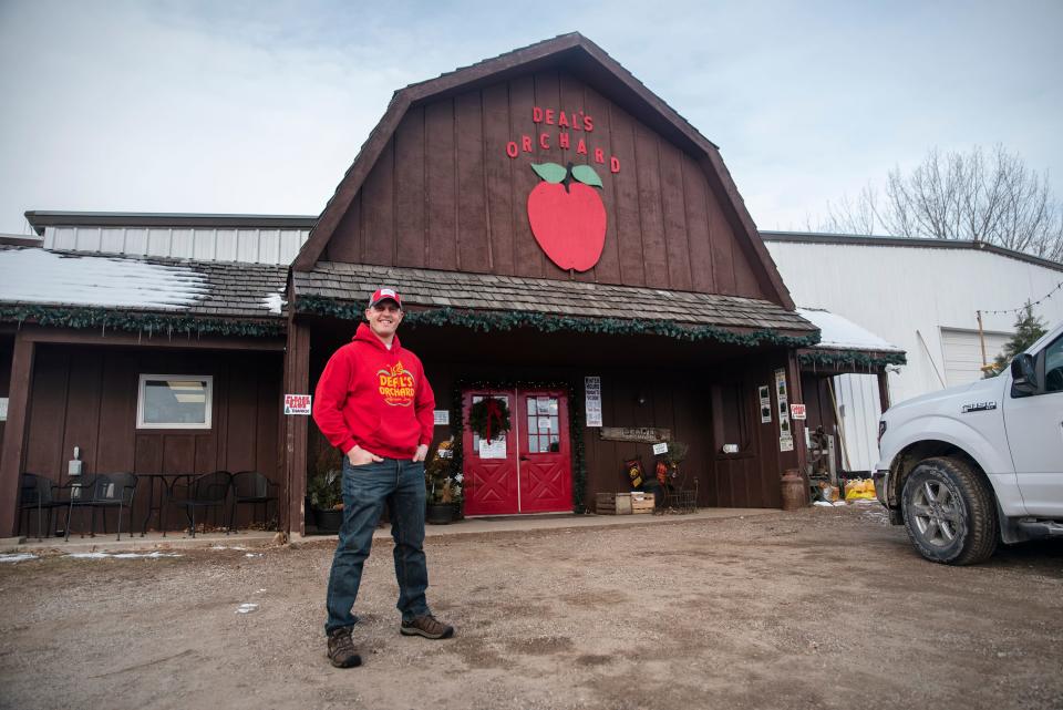 Chris Deal poses for a portrait at Deal's Orchard in Jefferson, Iowa