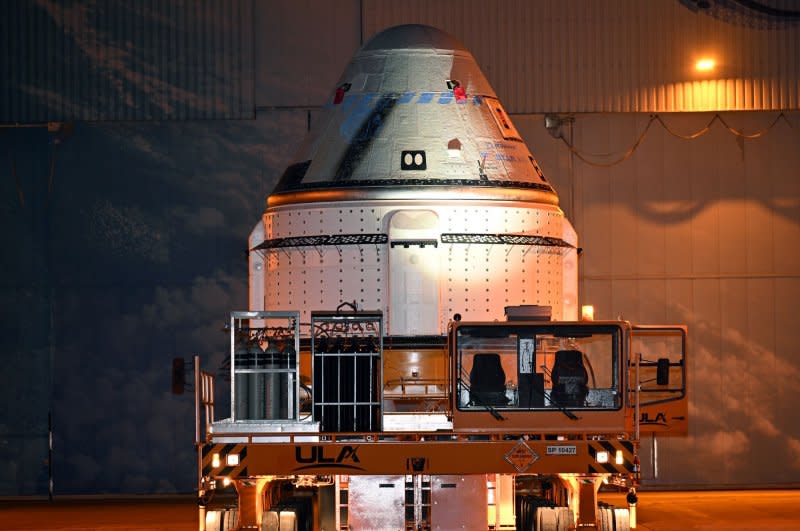 Boeing rolls out its "Starliner" spacecraft from the Commercial Crew and Cargo Processing Facility at Kennedy Space Center in Florida on Tuesday. Photo by Joe Marino/UPI