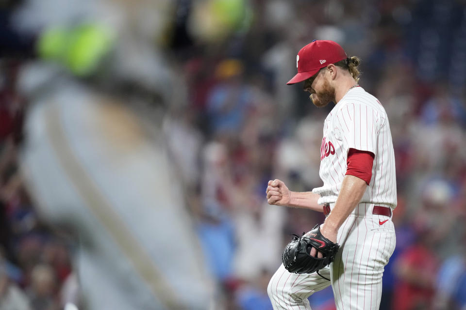 Philadelphia Phillies pitcher Craig Kimbrel reacts after getting Milwaukee Brewers' Raimel Tapia to fly out to end their baseball game, Tuesday, July 18, 2023, in Philadelphia. (AP Photo/Matt Slocum)