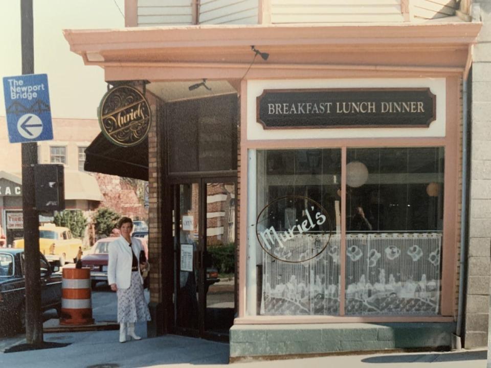 Muriel Barclay de Tolley standing outside her Spring Street restaurant back in the day.