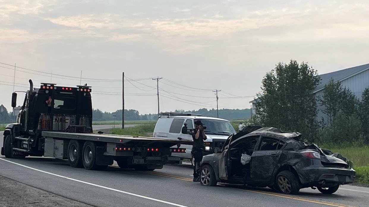 Two people died in an accident in Saint-Gédéon, Que., on July 18. As the holidays continue into August, police are urging motorists to remain cautious when travelling.  (Louis Martineau/Radio-Canada - image credit)