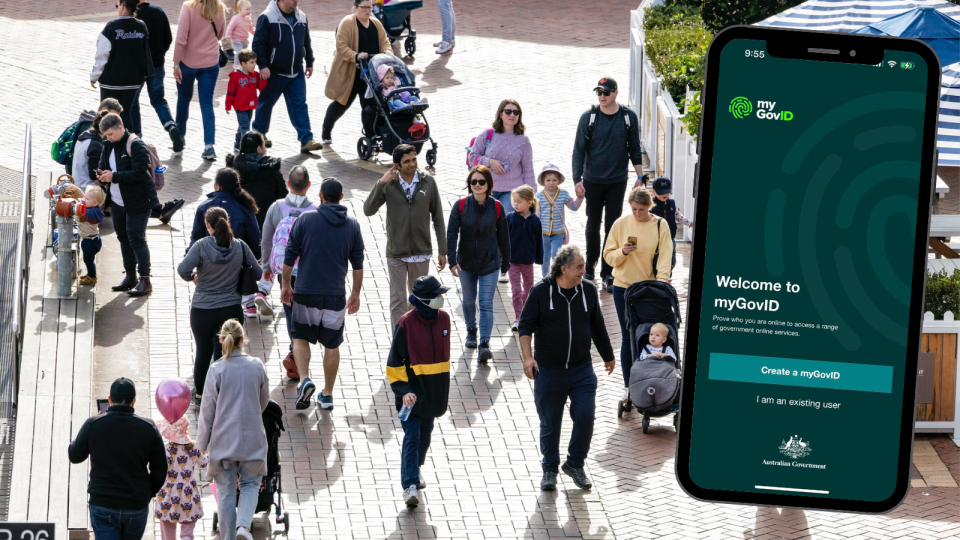 A composite image of a crowd of people walking on the street and a screenshot of the myGovID app.