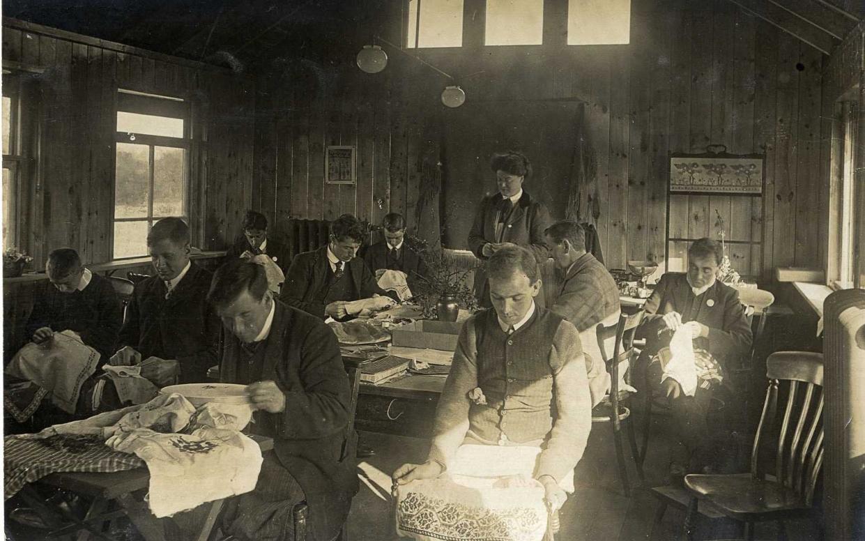 A stitch in time: Louisa Pesel showing First World War soldiers how to sew - Leeds University library