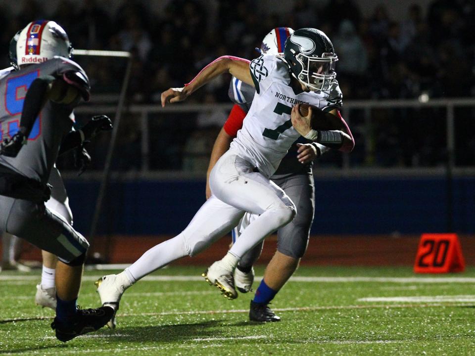 Northridge's Lane Hess breaks free on his way to the end zone for a touchdown against Lakewood at Calhoun Memorial Field on Friday, Sept. 30, 2022. Hess led the visiting Vikings to their first win, 34-20 against the Lancers.