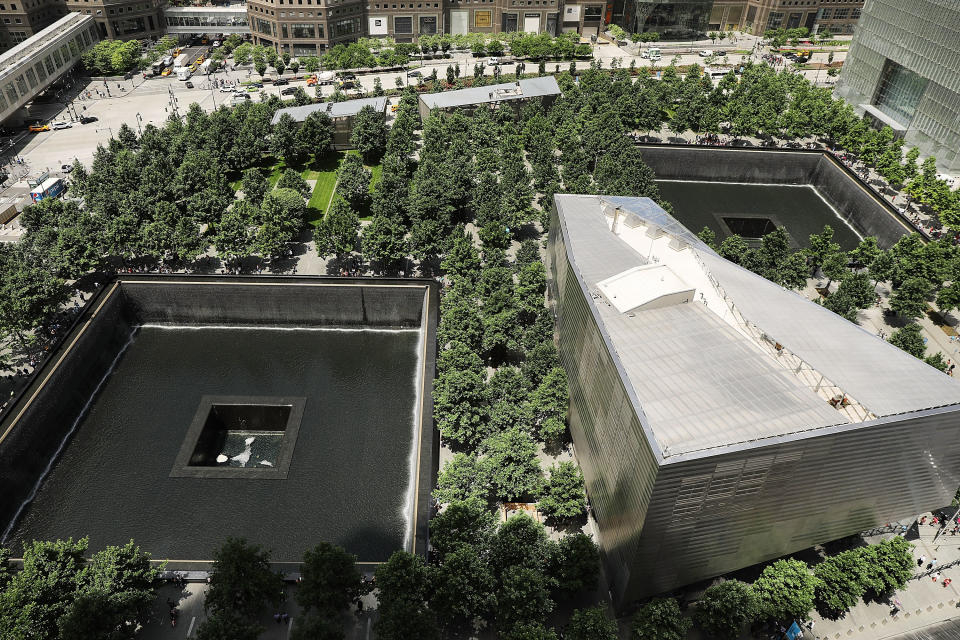 NEW YORK, NY - JUNE 11:  The reflecting pools at the National September 11 Memorial stand under Three World Trade Center, the third skyscraper to be built on the site of the original Twin Towers in Lower Manhattan and which officially opened on Monday morning on June 11, 2018 in New York City. The fifth tallest building in New York City,  Three World Trade Center was built by developer Larry Silverstein, chairman of the Silverstein Properties, and cost the $2.7 billion. It features a a total of 2.5 million square feet of office space and stands at 1,079-feet-tall.  (Photo by Spencer Platt/Getty Images)