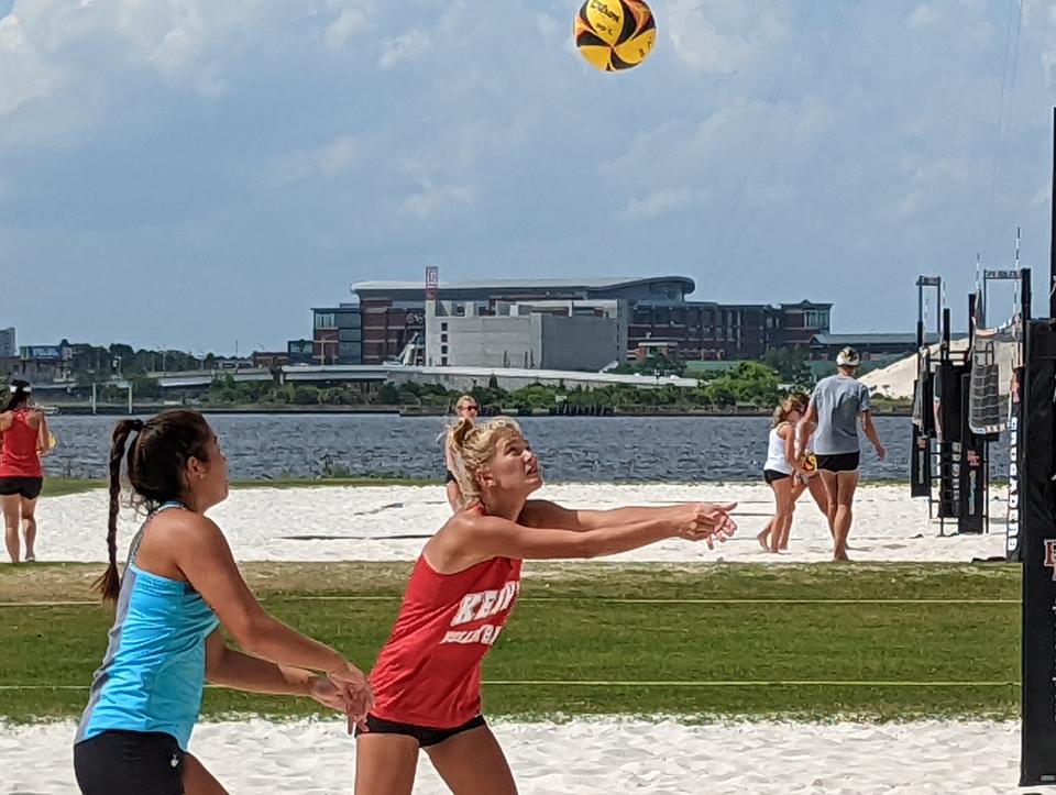 Bishop Kenny players run through high school beach volleyball practice ahead of the FHSAA championships on May 3, 2022. [Clayton Freeman/Florida Times-Union]