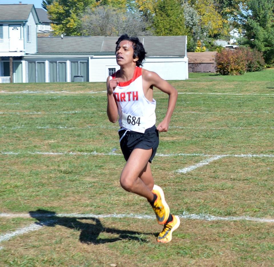 North Hagerstown's Rishi Bhat starts his sprint to the finish of the Central Maryland Conference boys cross country race on Oct. 21, 2022, at Boonsboro. Bhat placed fourth overall and second in the Spires Division.