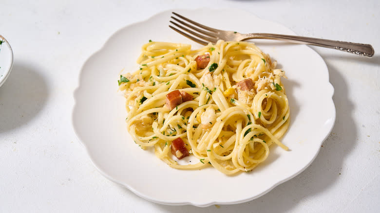 crab boil carbonara on plate