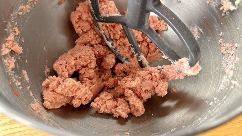 Strawberry shortbead dough in bowl