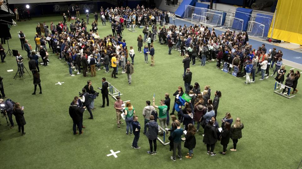 PHOTO: In this Feb. 3, 2020, file photo, participants gather for their preferred democratic presidential candidate during the first-in-the-nation Iowa caucus at the Drake University Knapp Center arena in Des Moines, Iowa. (Bloomberg via Getty Images, FILE)