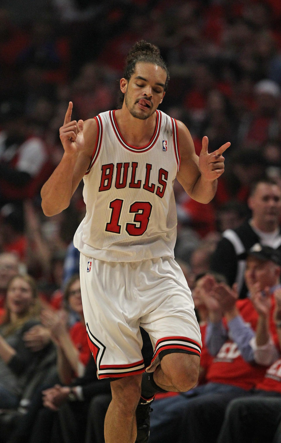 CHICAGO, IL - MAY 01: Joakim Noah #13 of the Chicago Bulls celebrates hitting a shot against the Philadelphia 76ers in Game Two of the Eastern Conference Quarterfinals during the 2012 NBA Playoffs at the United Center on May 1, 2012 in Chicago, Illinois. NOTE TO USER: User expressly acknowledges and agrees that, by downloading and or using this photograph, User is consenting to the terms and conditions of the Getty Images License Agreement. (Photo by Jonathan Daniel/Getty Images)