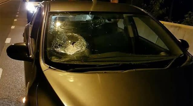 A huge rock was thrown at the car. Source: Supplied