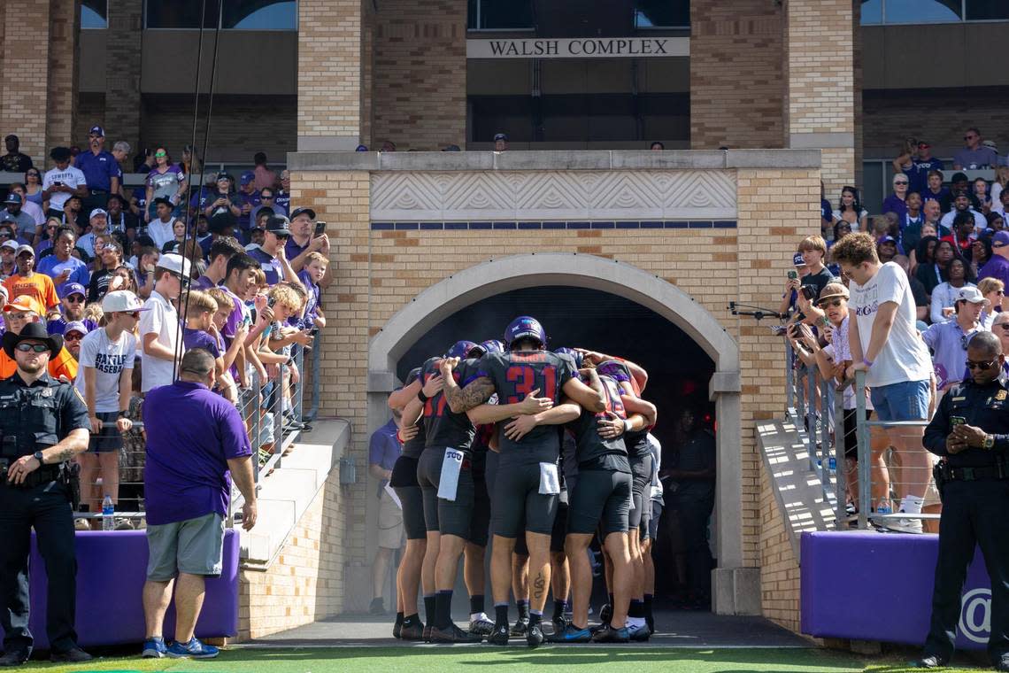 The TCU Horned Frogs football team huddles before the beginning of their game against OSU at the Amon G. Carter Stadium in Fort Worth, on Saturday, Oct. 16, 2022. Madeleine Cook/mcook@star-telegram.com