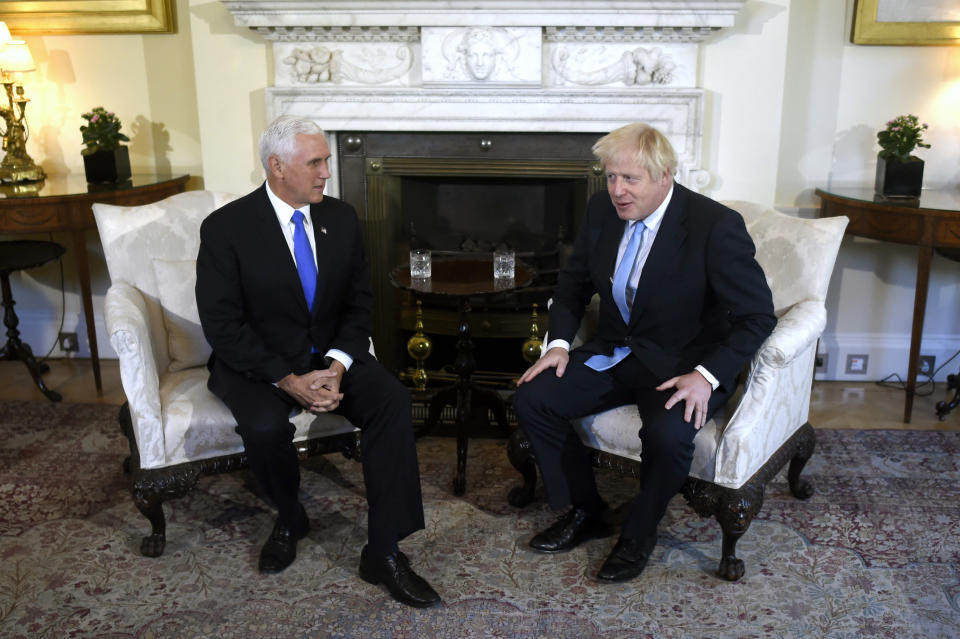 Britain's Prime Minister Boris Johnson, right, meets with US Vice President Mike Pence inside 10 Downing Street in London, Thursday, Sept. 5, 2019. (Peter Summers/Pool photos via AP)