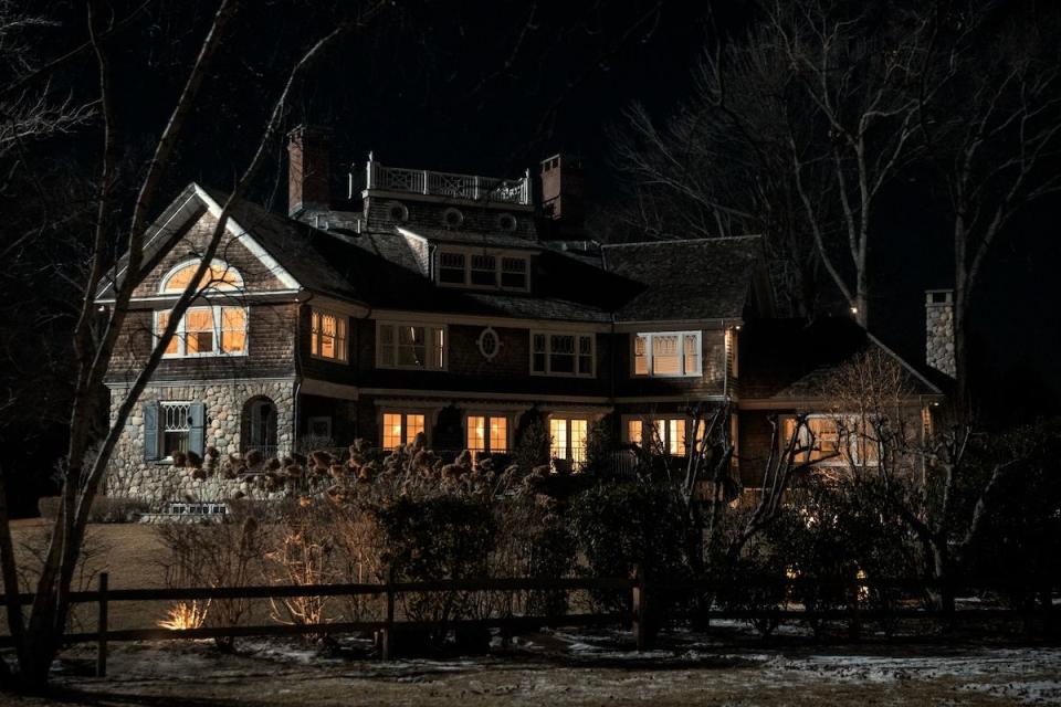 exterior shot of the watcher house in new york at night