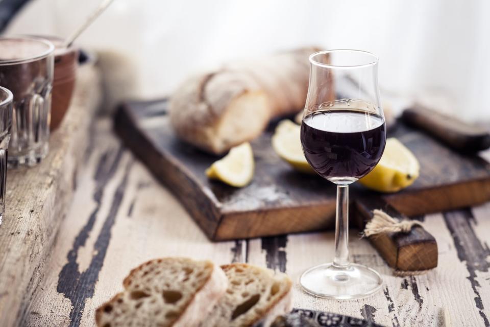 glass of port with bread and fruit