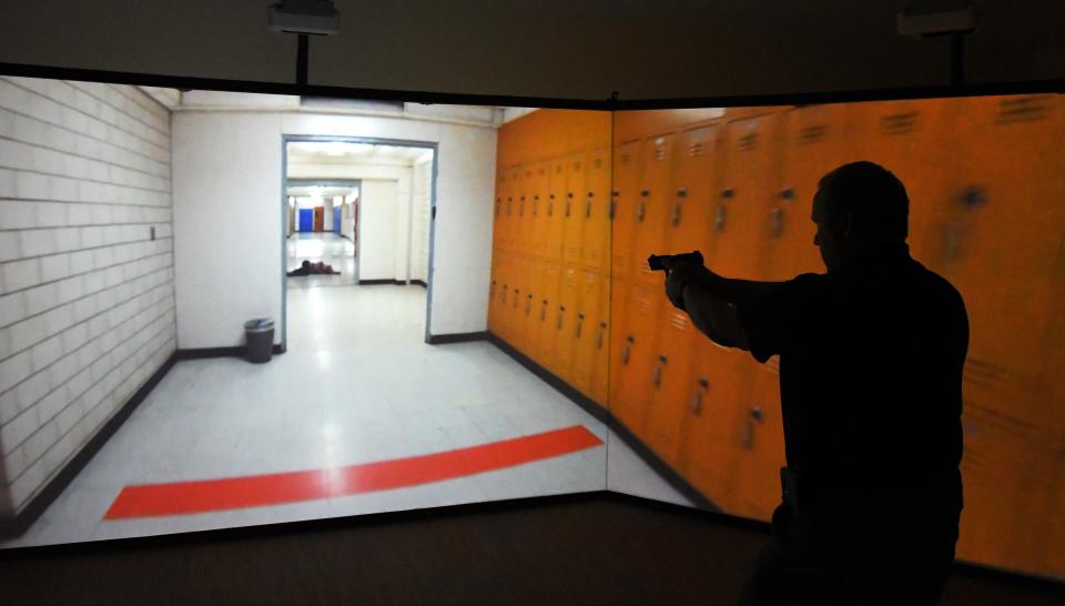 A high-tech interactive training system was set up at a Brevard County Sheriff's Office facility in Sharpes for guardian training in May 2019. Participants were armed with simulated handguns and were and immersed in a 300-degree video simulating an active shooting situation in a school, office and other locations. It's not clear if it is currently part of the training program for armed guardians in Brevard Public Schools.