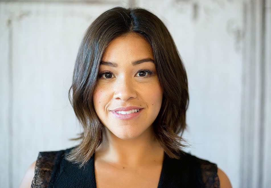 Gina Rodriguez’s little black dress is slaying our souls with a lovely lacy surprise