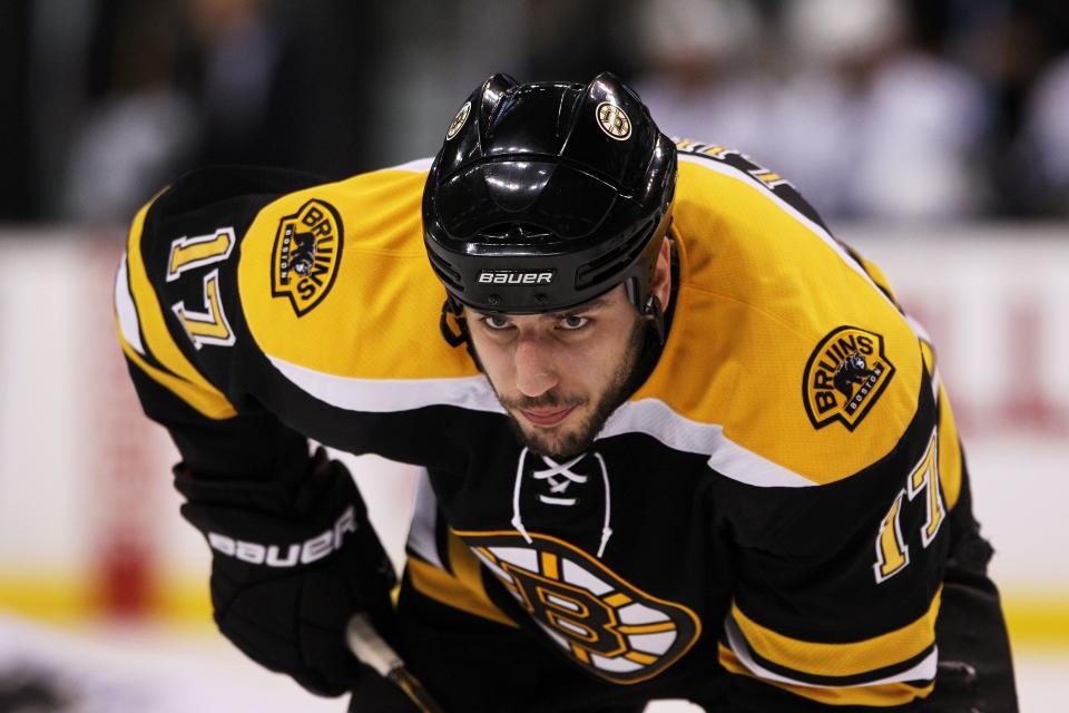 BOSTON, MA - MAY 14:  Milan Lucic #17 of the Boston Bruins loks on against the Tampa Bay Lightning in Game One of the Eastern Conference Finals during the 2011 NHL Stanley Cup Playoffs at TD Garden on May 14, 2011 in Boston, Massachusetts.  (Photo by Bruce Bennett/Getty Images)