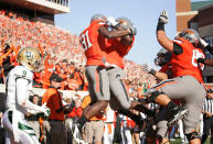 STILLWATER, OK - OCTOBER 29: Wide receiver Justin Blackmon #81 and fullback Kye Staley #9 of Oklahoma State Cowboys celebrate a touchdown in the first half against the Baylor Bears on October 29, 2011 at Boone Pickens Stadium in Stillwater, Oklahoma. Oklahoma State leads Baylor 35-0 at the half. (Photo by Brett Deering/Getty Images)