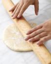 <div class="caption-credit"> Photo by: Martha Stewart Living</div><div class="caption-title">Roll the Dough into Rounds About This Thick</div><b>Roll the Dough into Rounds About This Thick</b> <br> A round that is 1/2 inch thick and 8 inches in diameter -- as opposed to the standard hockey-puck size -- will chill more quickly and soften more uniformly when removed from the refrigerator. <br> <br> Now that you're trained in piecrust making, follow our tips for mastering <a rel="nofollow noopener" href="http://www.marthastewart.com/274216/making-decorative-piecrusts/@center/276949/everything-thanksgiving?xsc=shine_ms_piecrust101" target="_blank" data-ylk="slk:decorative pies;elm:context_link;itc:0;sec:content-canvas" class="link ">decorative pies</a>! <br>