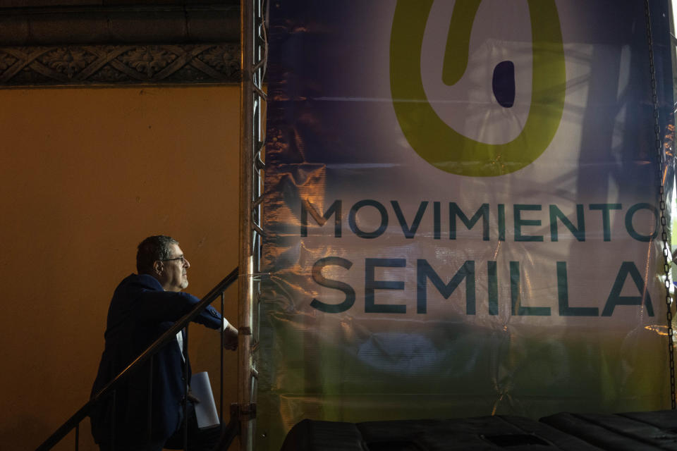 Bernardo Arevalo, presidential candidate of the Semilla party, waits to enter a stage during his closing campaign rally in Guatemala City, Wednesday, June 21, 2023. Guatemalans go to the polls on June 25. (AP Photo/Moises Castillo)