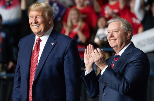 Then President Donald Trump and Sen. Lindsey Graham in February 2020.  (Photo: SAUL LOEB via Getty Images)