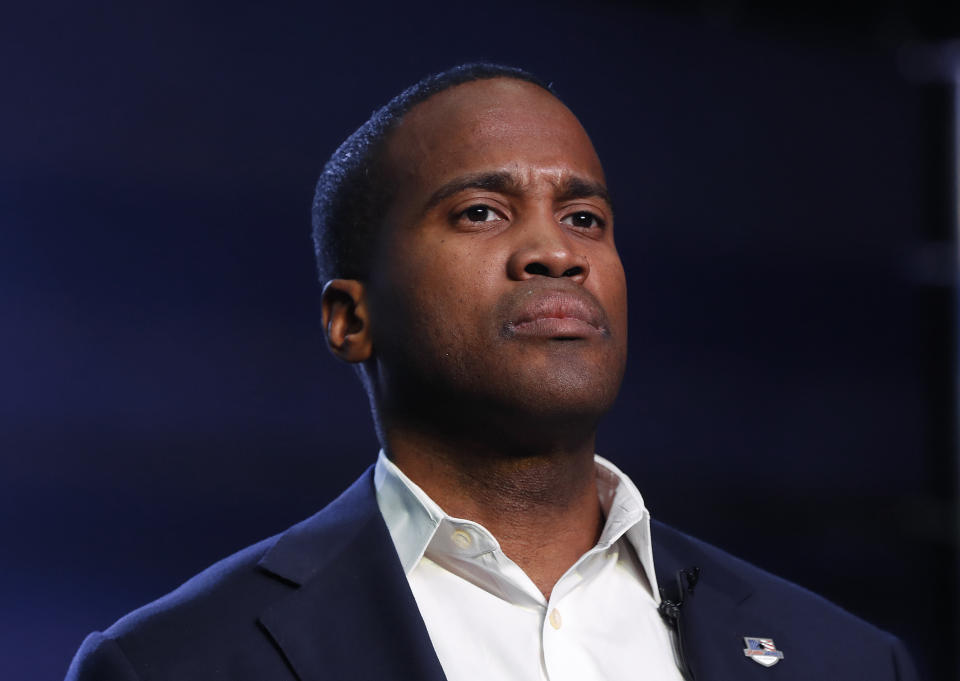 FILE - In this Oct. 17, 2018, file photo, Republican U.S. Senate candidate John James speaks during a rally in Pontiac, Mich. James appeared with President Donald Trump in May in Michigan, where polls have trended against the president, James demurred when asked about his 2017 comment that he backs Trump “2,000%.” James said he supports Trump, adding, “I’m looking forward to running my own race, being my own man.” (AP Photo/Paul Sancya, File)