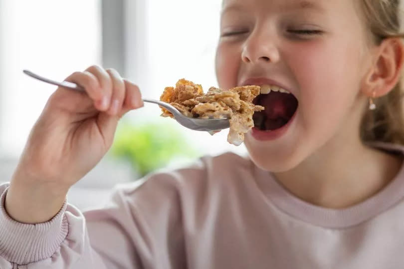 Girl eating cereal